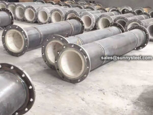 Abrasion resistant ceramic tile lined steel pipes
